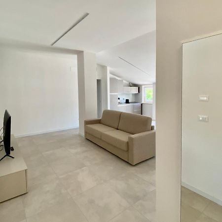 Em Apartments Lignano Sabbiadoro Bagian luar foto