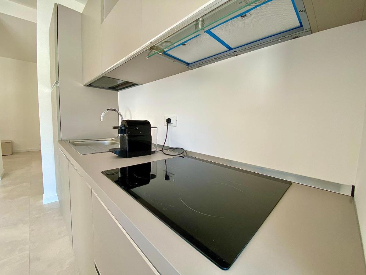 Em Apartments Lignano Sabbiadoro Bagian luar foto