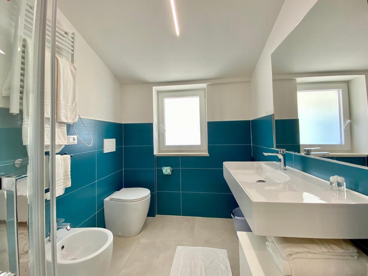 Em Apartments Lignano Sabbiadoro Bagian luar foto