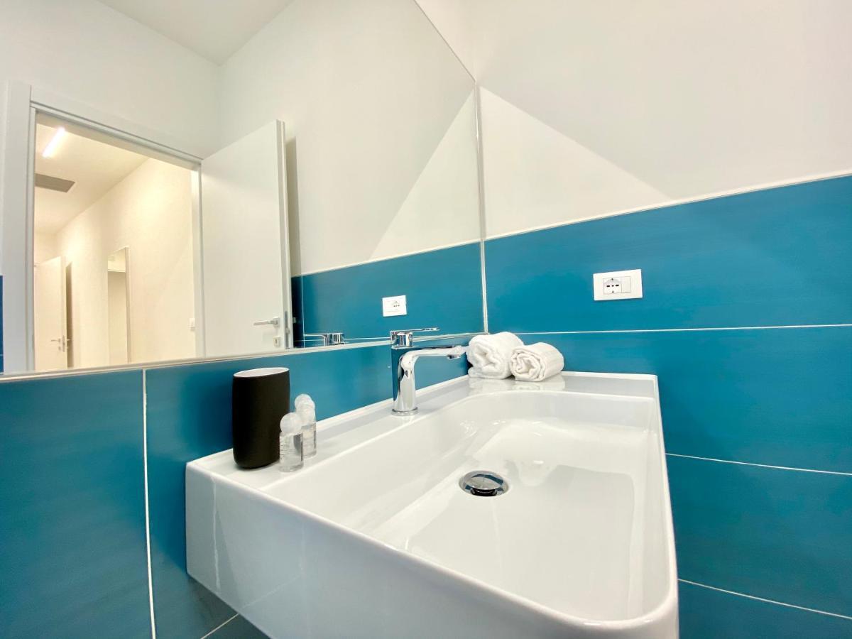 Em Apartments Lignano Sabbiadoro Bagian luar foto