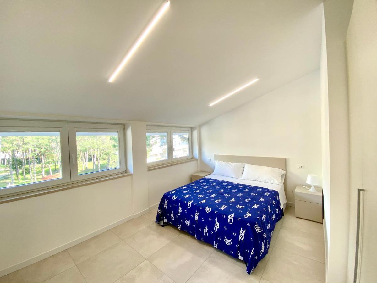 Em Apartments Lignano Sabbiadoro Bagian luar foto