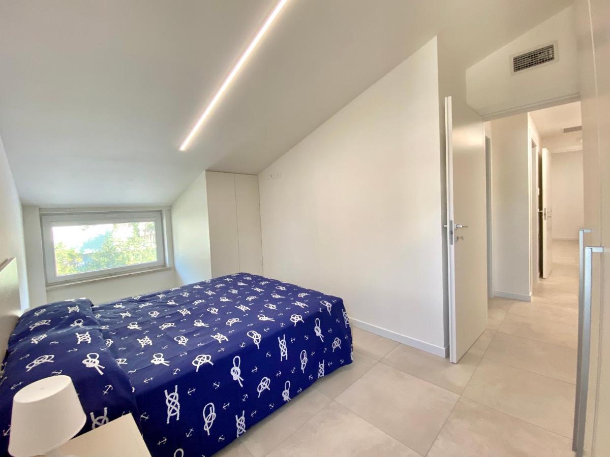 Em Apartments Lignano Sabbiadoro Bagian luar foto