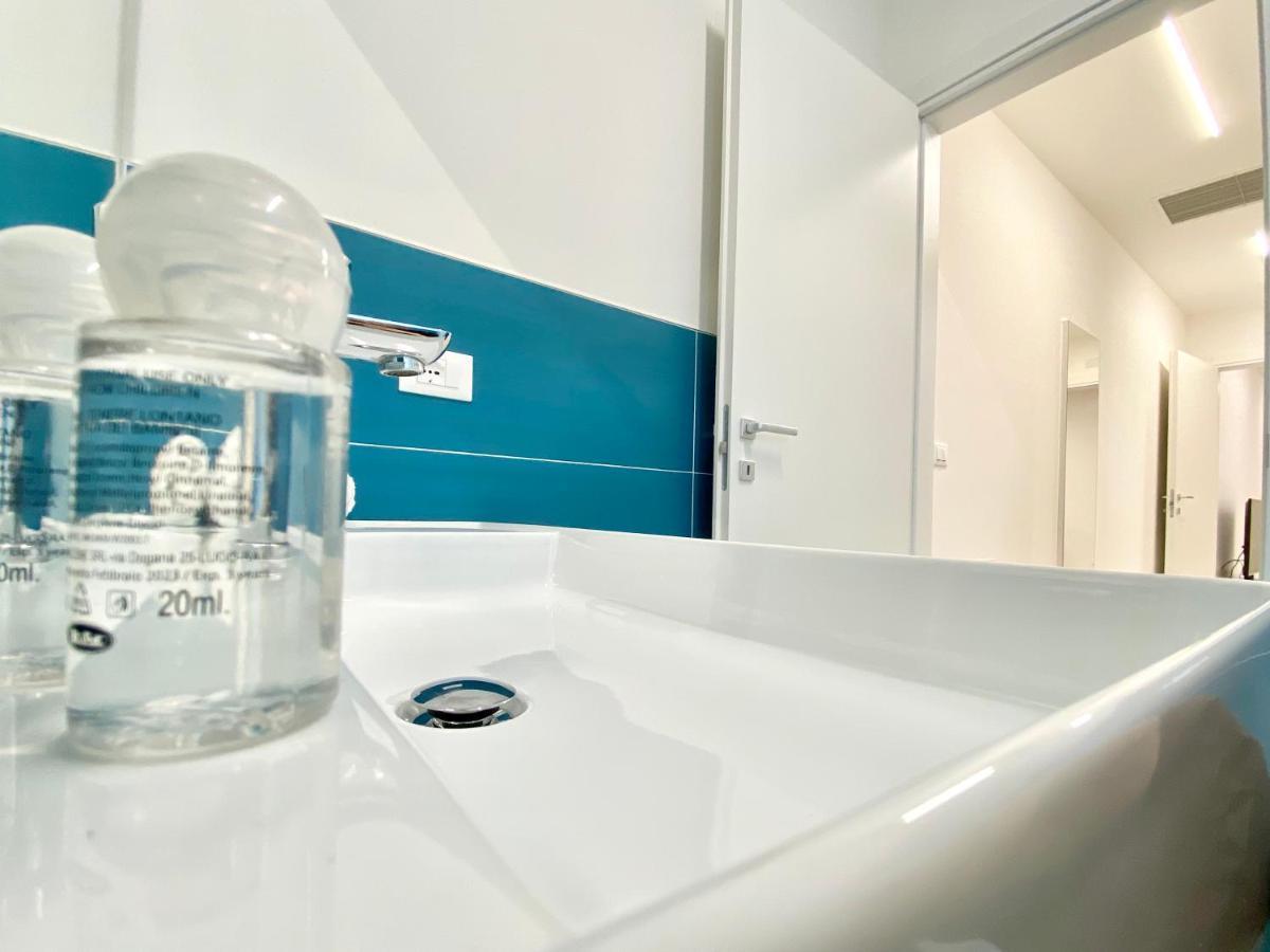 Em Apartments Lignano Sabbiadoro Bagian luar foto
