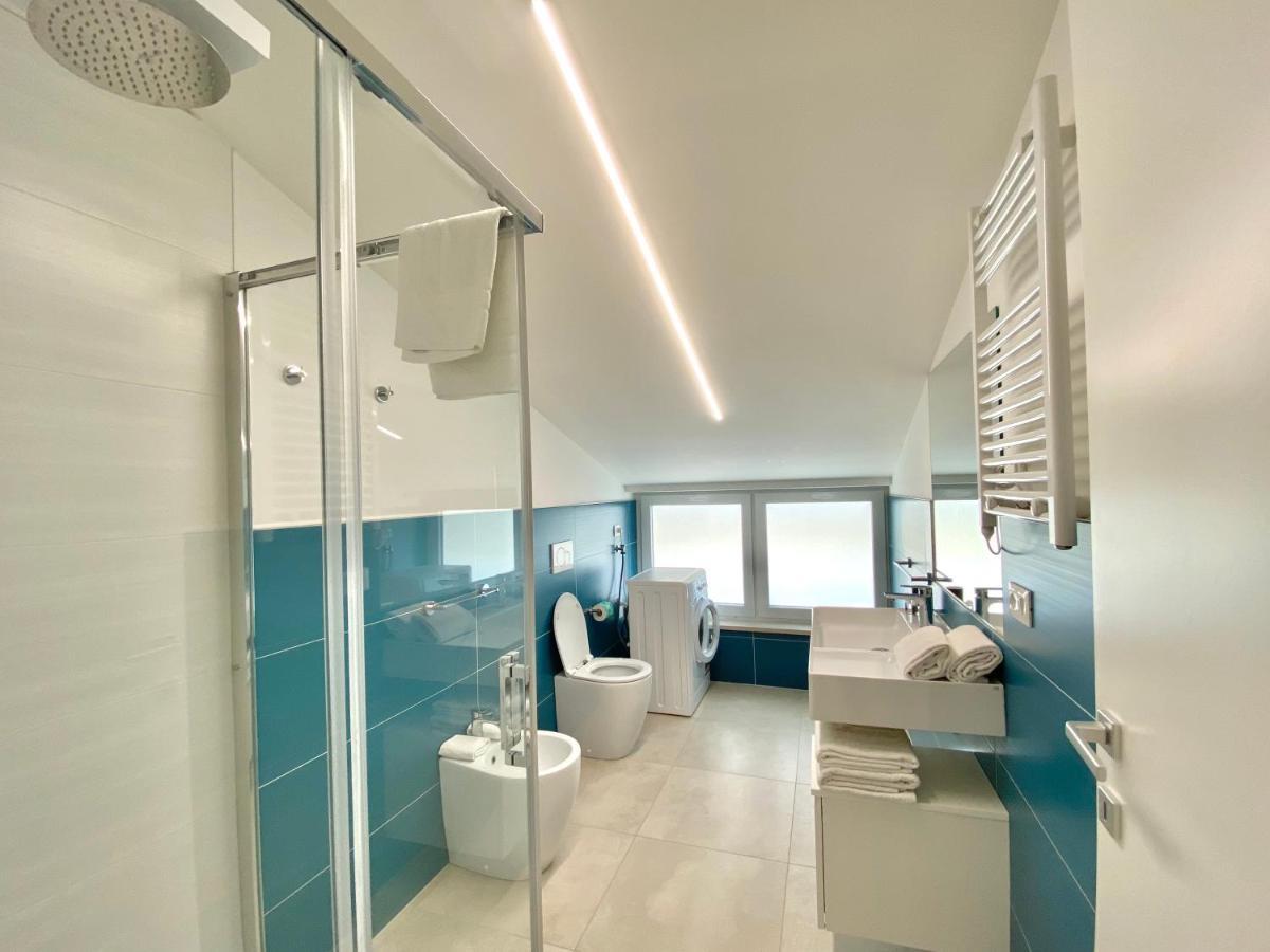 Em Apartments Lignano Sabbiadoro Bagian luar foto