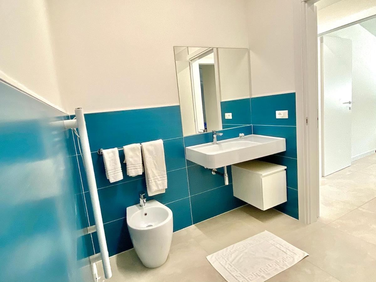 Em Apartments Lignano Sabbiadoro Bagian luar foto