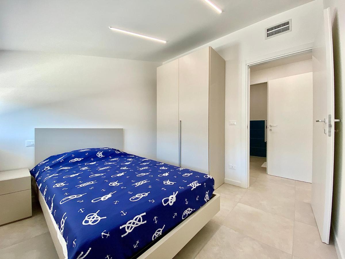 Em Apartments Lignano Sabbiadoro Bagian luar foto