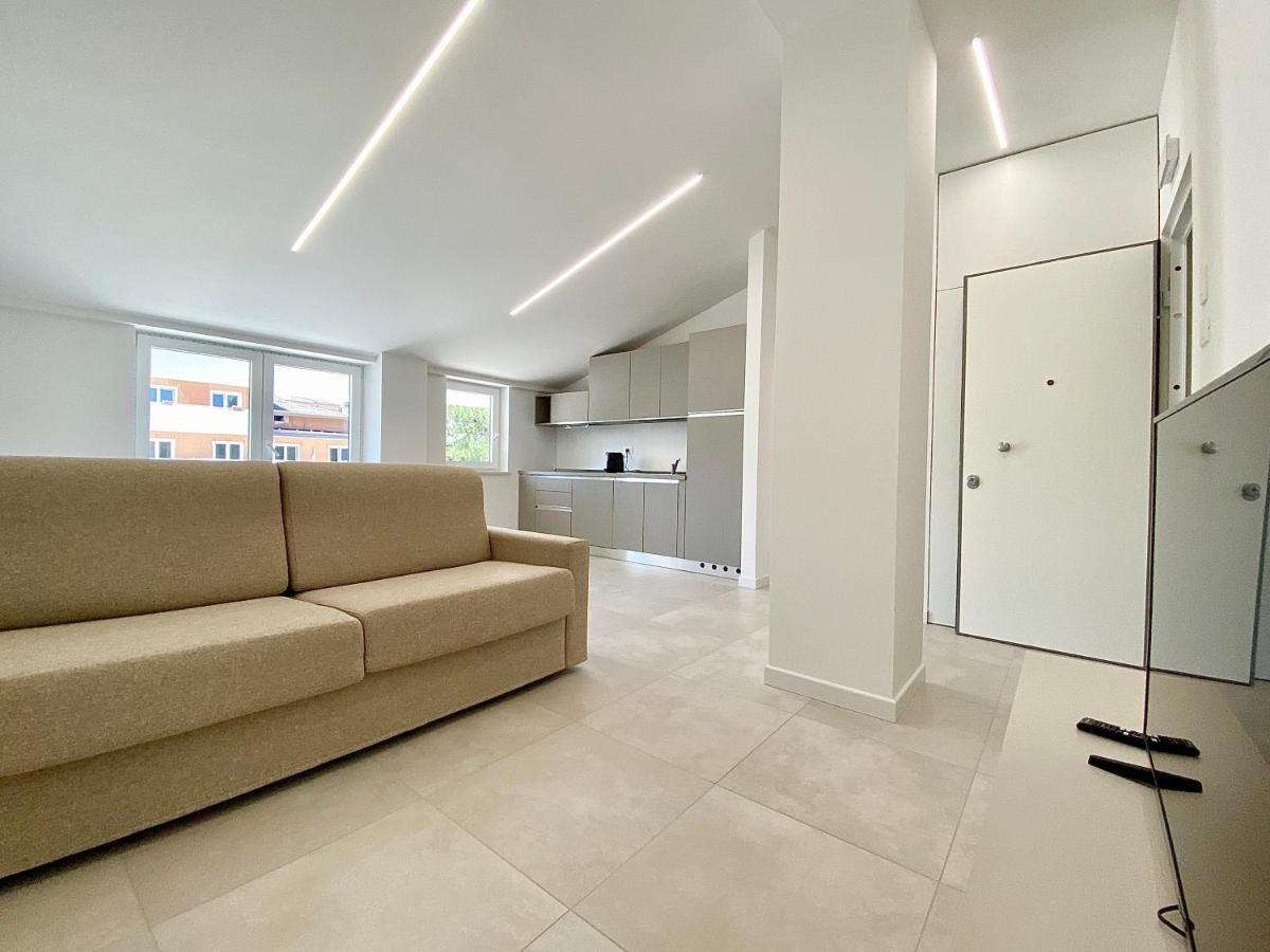 Em Apartments Lignano Sabbiadoro Bagian luar foto