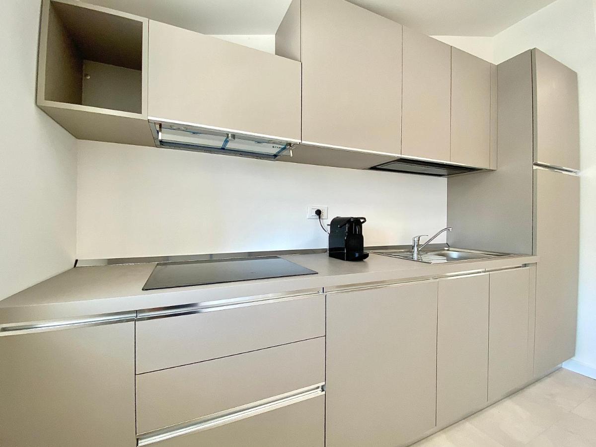 Em Apartments Lignano Sabbiadoro Bagian luar foto